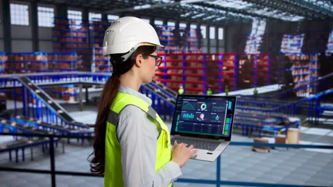 Person Uses Computer To Manage Warehouse Inventory Stock Footage 335880337