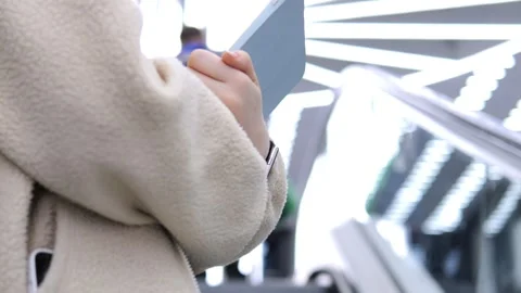 Person uses digital tablet with green screen while seated in vehicle Stock Footage 341994083