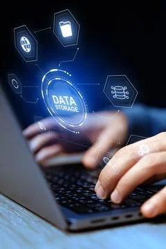 Person uses laptop to access data storage options at home during the day Foto stock
