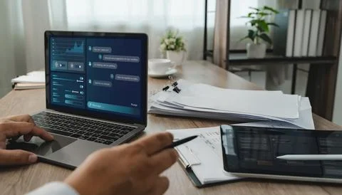 Person uses LLM-based AI chatbot software on a laptop documents, interactin.. 写真素材