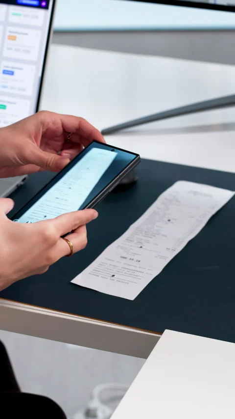 Person Uses Smartphone To Scan Receipt Stock Footage 339909063
