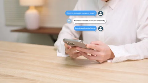 A person using AI assistant chatbot for advice on managing a budget. Stock Footage 316656866