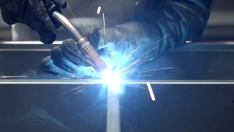Person using a blowtorch on a factory close up 動画素材 75167301