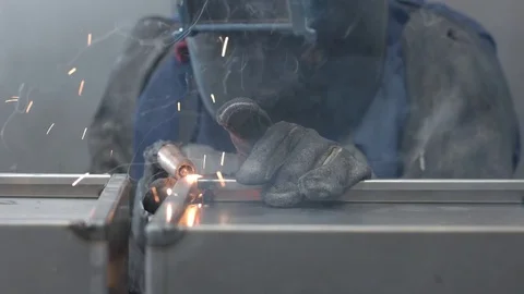 Person using a blowtorch on a factory 動画素材 75167323