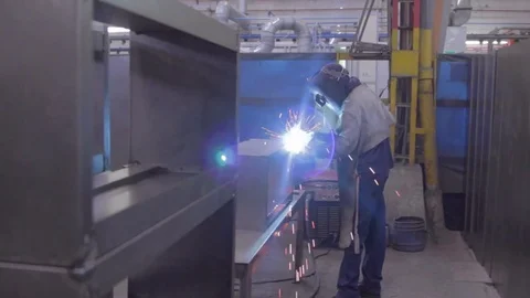 Person using a blowtorch on a factory Stock-Footage 75167447