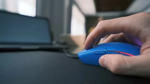 Person Using Blue Computer Mouse Hand Close Up Wide Close-up Stock Footage 238969182