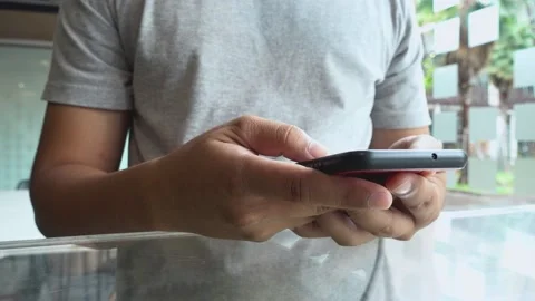 A person using a cell phone 库存影片 156848705