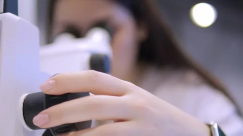 Person is using a cell phone while sitting at a table with a cup of coffee Stock Footage 297650362