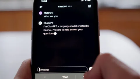 Person using ChatGPT to ask it questions about itself Stock Footage 256269256