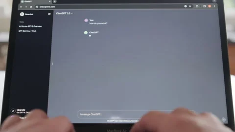 Person using ChatGPT to ask it questions about itself Stock Footage 256269564