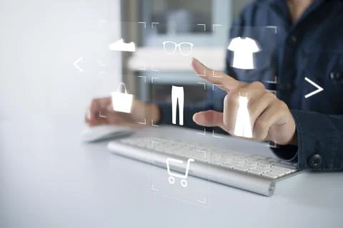 Person using computer and touch virtual screen online shopping. And online pa Stock Photos