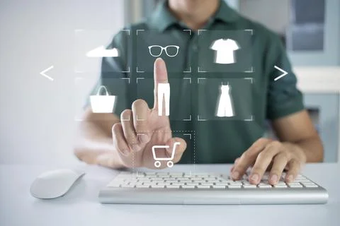 Person using computer and touch virtual screen online shopping. And online pa Stock Photos