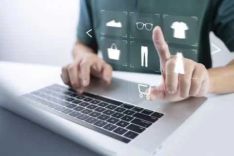 Person using computer and touch virtual screen online shopping. And online pa Stock Photos
