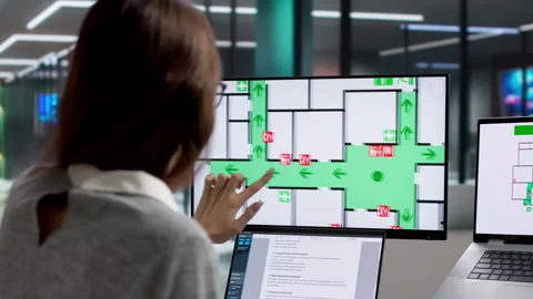 Person Using Computer To Check Fire Alarm For Safety Stock Footage 334928481