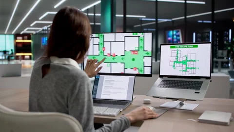 Person Using Computer To Check Fire Alarm For Safety Stock Footage 335454522