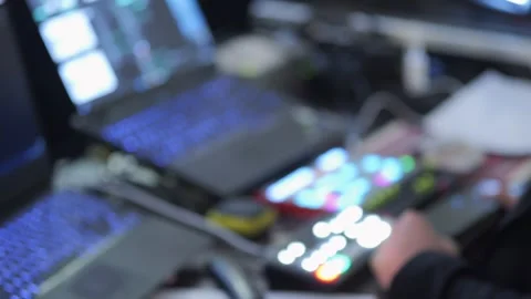 Person is using a computer with a keyboard and a cell phone Stock Footage 301626281