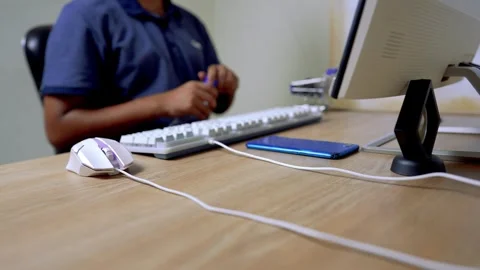 Person Using Computer Mouse and Keyboard at Desk Video stock 315981402