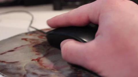 Person Using a Computer Mouse Stock Footage 237966597