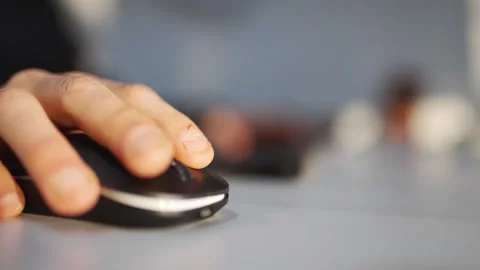 A person is using a computer mouse Stock-Footage 302442224