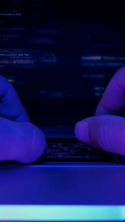 Person using computer, typing on keyboard, close up of hands. Vertical video Stock Footage 317305841