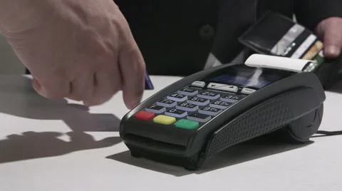 Person using credit card processing terminal in Ukraine Stock Footage 47864103
