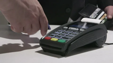Person using credit card processing terminal in Ukraine Stock Footage 47864493