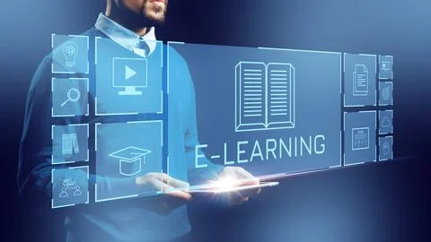 Person using a digital device to explore e learning options in a modern setting Stock Photos
