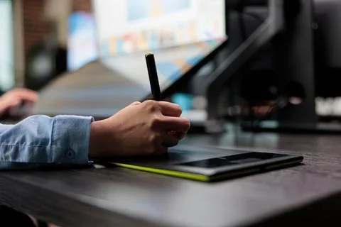 Person using digital drawing tablet with stylus Stock Photos