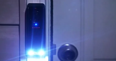 A person using an Eufy video doorbell at night. Stock Footage 249648021