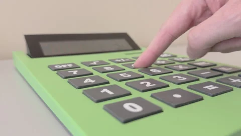 Person using extra large calculator to do math 4k Stock Footage 332382935