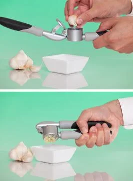 Person using a garlic press Stock Photos
