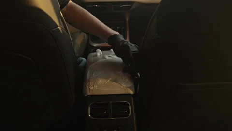 Person Using Glove To Clean Car Leather Stock Footage 335214125