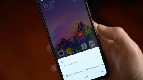 A Person Using Google Assistant on a Smartphone, 2020 Stock Footage 122340753