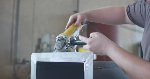 Person Using a Grinding Tool Stock Footage 200790392