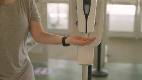 Person Using Hand Sanitizer Stock Footage 265506829