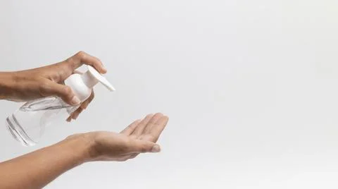 Person using hand sanitizer gel copy space. High quality and resolution Stock Photos