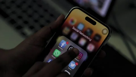 Person using Instagram on a Smartphone. Finger Scrolling Social Media App Feed. Stock Footage 245426367