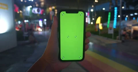 Person using internet chroma key on screen use smartphone. Gadget with green Stock Footage 250532890