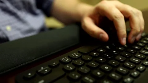 Person using keyboard Video stock 140057299