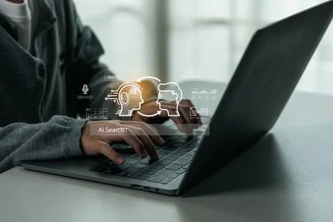 Person using laptop computer with artificial intelligence digital interface.. Stock-Fotos