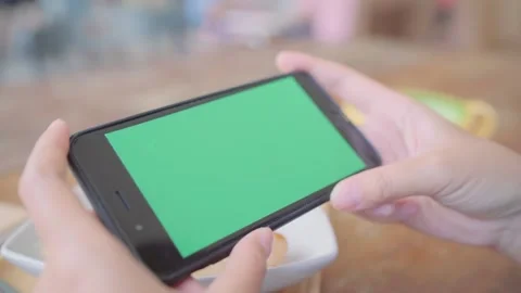 A person using a laptop computer sitting on top of a table 스톡 동영상 157866332