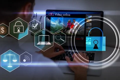 Person using a laptop computer with technology cybersecurity and privacy concept Stock Photos