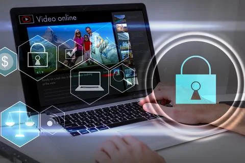 Person using a laptop computer with technology cybersecurity and privacy concept 스톡 사진