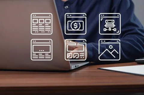 Person using laptop with interface icons on the screen background Stock Photos