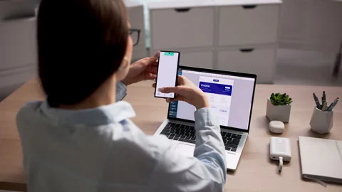 Person Using Laptop To Manage Electronic Invoice 库存影片 335880049