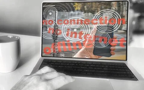 Person using laptop with no internet connection displayed on screen Stock Photos