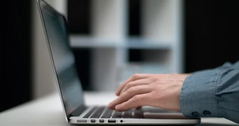 A Person Using A Laptop Notebook On The White Table Close Up Stock Footage 103554111