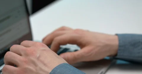 A Person Using A Laptop Notebook On A White Table Stock Footage 104828180