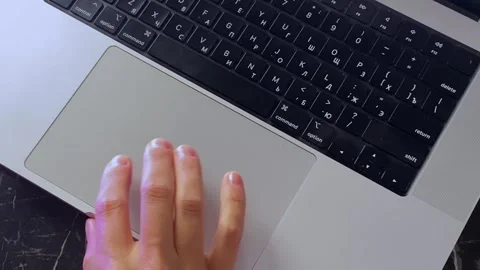 Person using laptop touchpad in close-up Video stock 346743127
