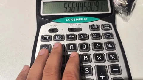 Person Using Large Display Calculator, 19/9/2026, Islamabad Video stock 345918505